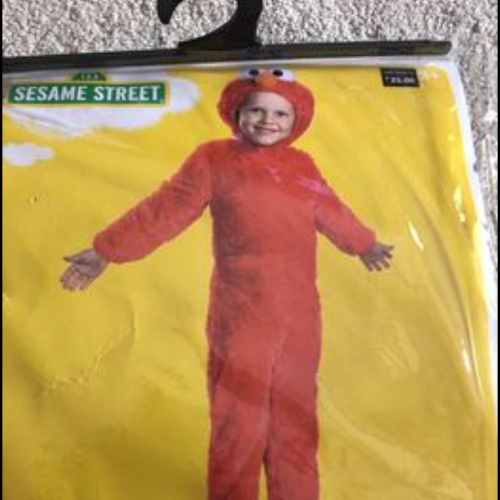 Child’s Elmo Halloween costume. New with tags, never worn. Size 3T